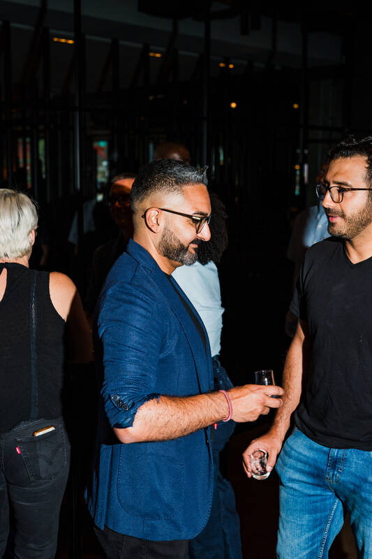 Guests in conversation at a tasting