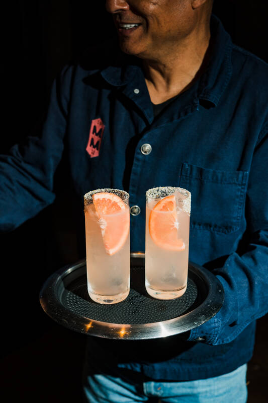 Cocktails carried out to guests during bar service
